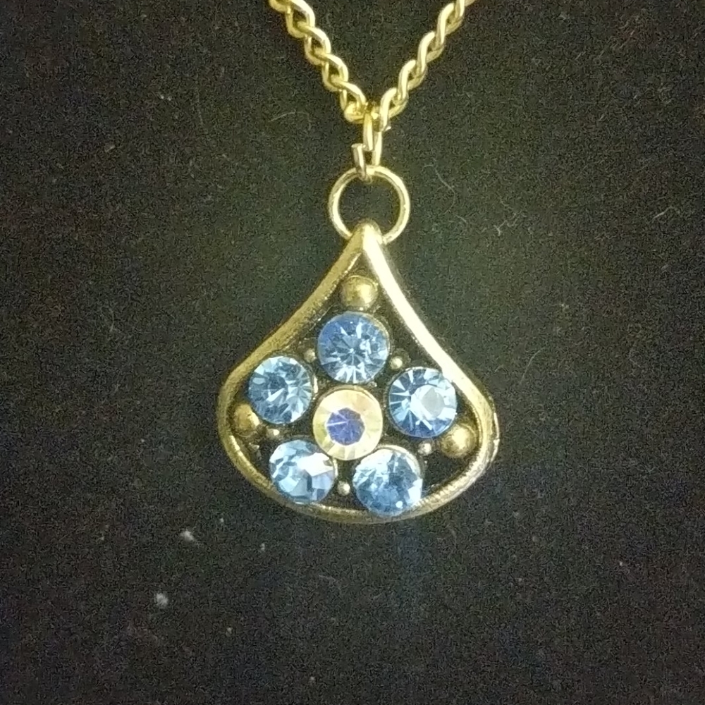 Unique flower with blue crystals 18 inch chain